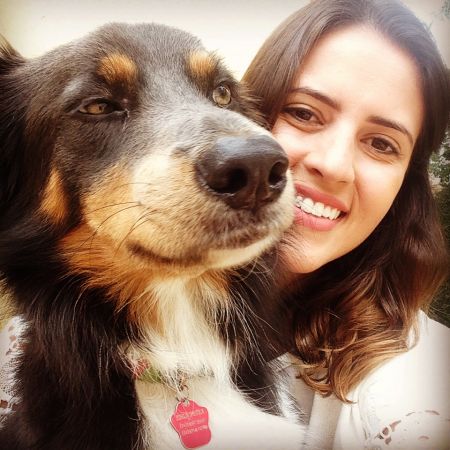 Cali,-a-4-yr-old-Border-Collie-cross-with-researcher-Luisa.JPG