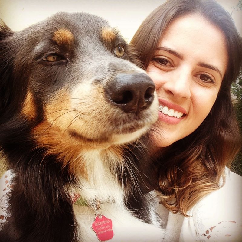 Cali,-a-4-yr-old-Border-Collie-cross-with-researcher-Luisa.JPG
